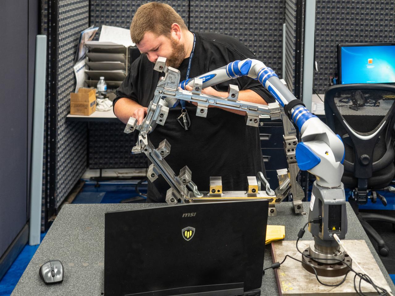 Parts for the Orion crew module which will carry astronauts on Artemis II are machined at Aerospace Engineering Corporation in California on June 18, 2018.