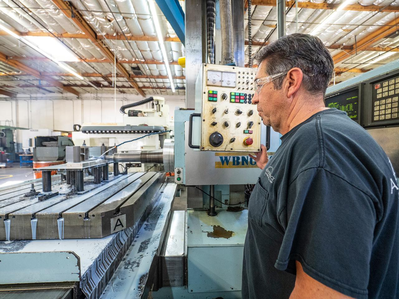 Parts for the Orion crew module which will carry astronauts on Artemis II are machined at Aerospace Engineering Corporation in California on June 18, 2018.