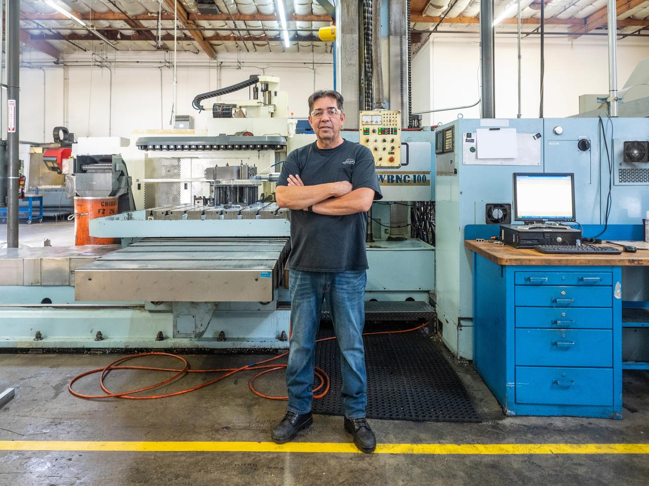 Parts for the Orion crew module which will carry astronauts on Artemis II are machined at Aerospace Engineering Corporation in California on June 18, 2018.