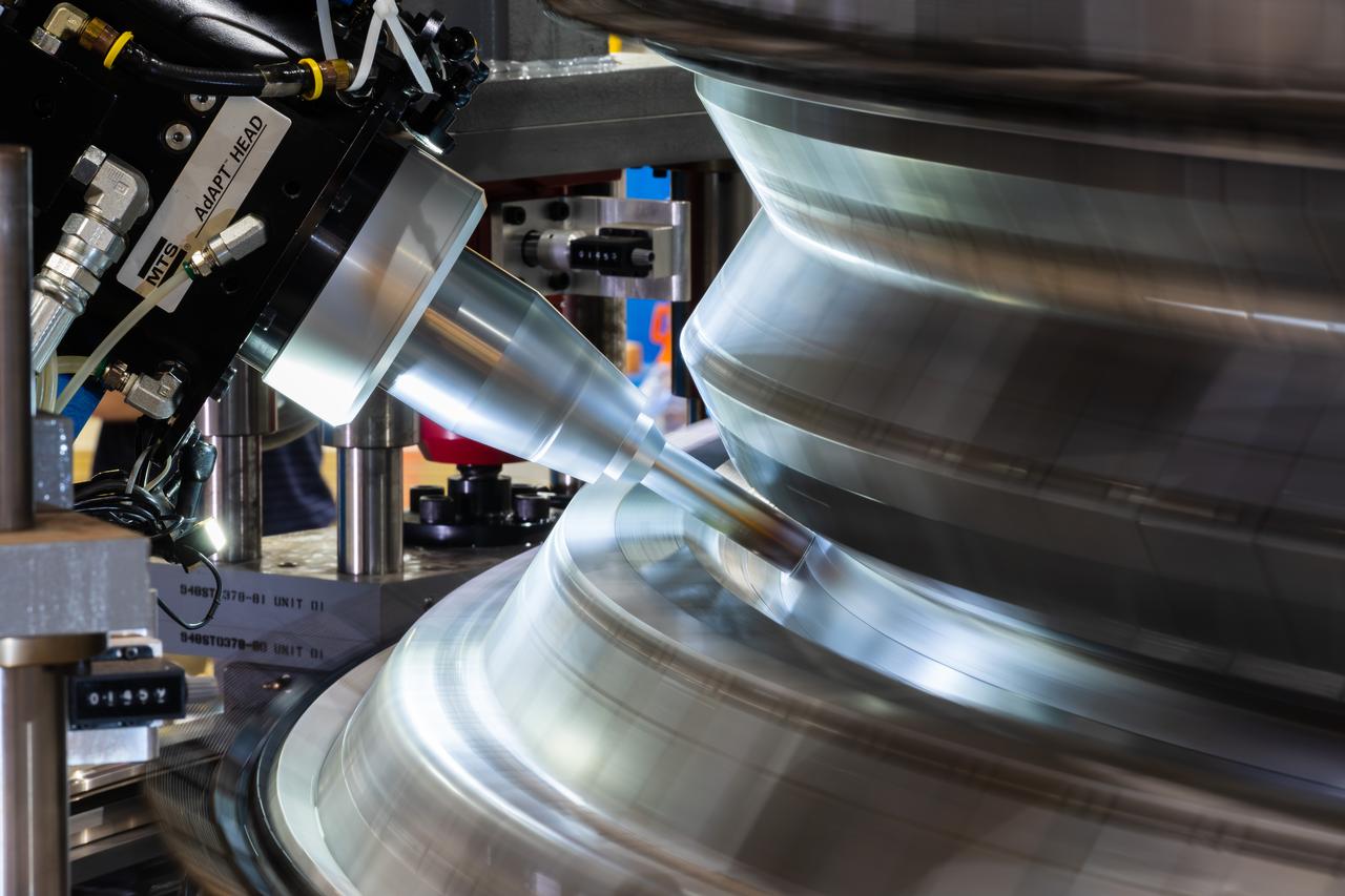 Lockheed Martin technicians at NASA's Michoud Assembly Facility in New Orleans, Louisiana, complete the final weld on the pressure vessel of the Orion crew module for Artemis II on July 24, 2018, the first flight of Orion with astronauts which will carry them farther into the solar system than ever before.