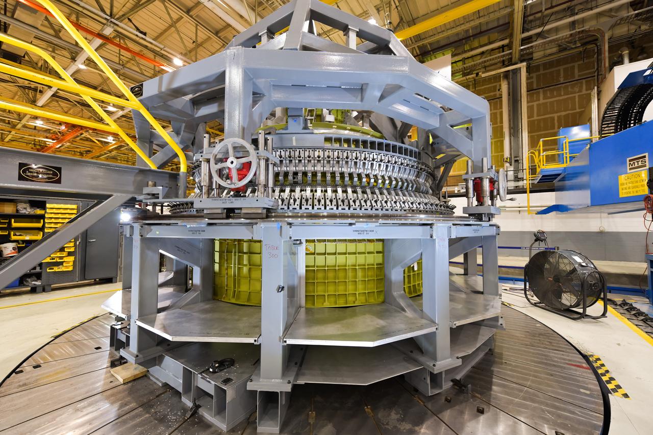 Lockheed Martin technicians at NASA's Michoud Assembly Facility in New Orleans, Louisiana, complete the final weld on the pressure vessel of the Orion crew module for Artemis II on July 24, 2018, the first flight of Orion with astronauts which will carry them farther into the solar system than ever before.
