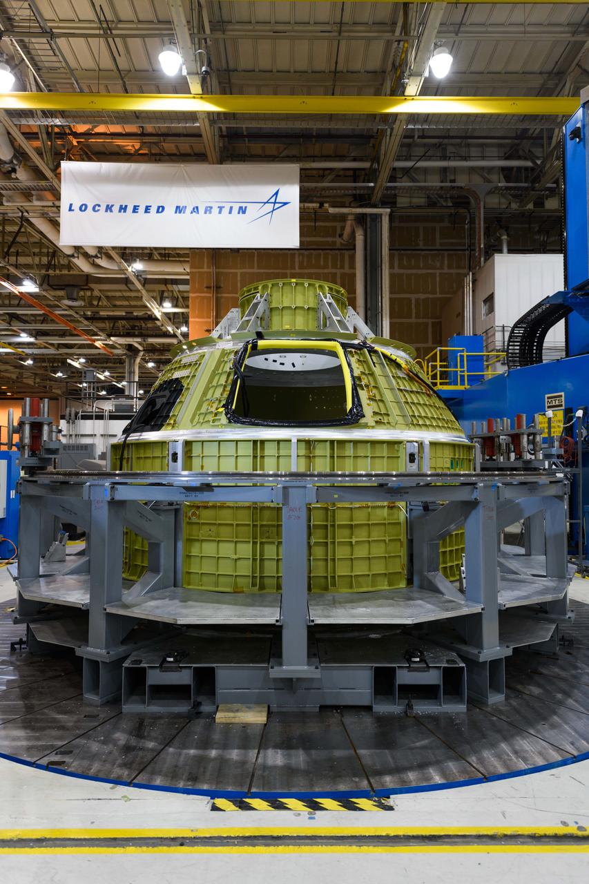 Lockheed Martin technicians at NASA's Michoud Assembly Facility in New Orleans, Louisiana, complete the final weld on the pressure vessel of the Orion crew module for Artemis II on July 24, 2018, the first flight of Orion with astronauts which will carry them farther into the solar system than ever before.