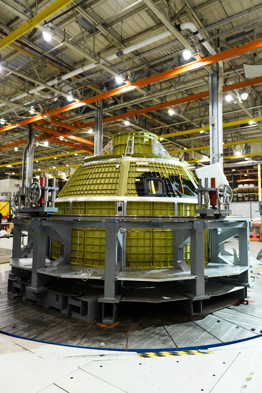 Lockheed Martin technicians at NASA's Michoud Assembly Facility in New Orleans, Louisiana, complete the final weld on the pressure vessel of the Orion crew module for Artemis II on July 24, 2018, the first flight of Orion with astronauts which will carry them farther into the solar system than ever before.