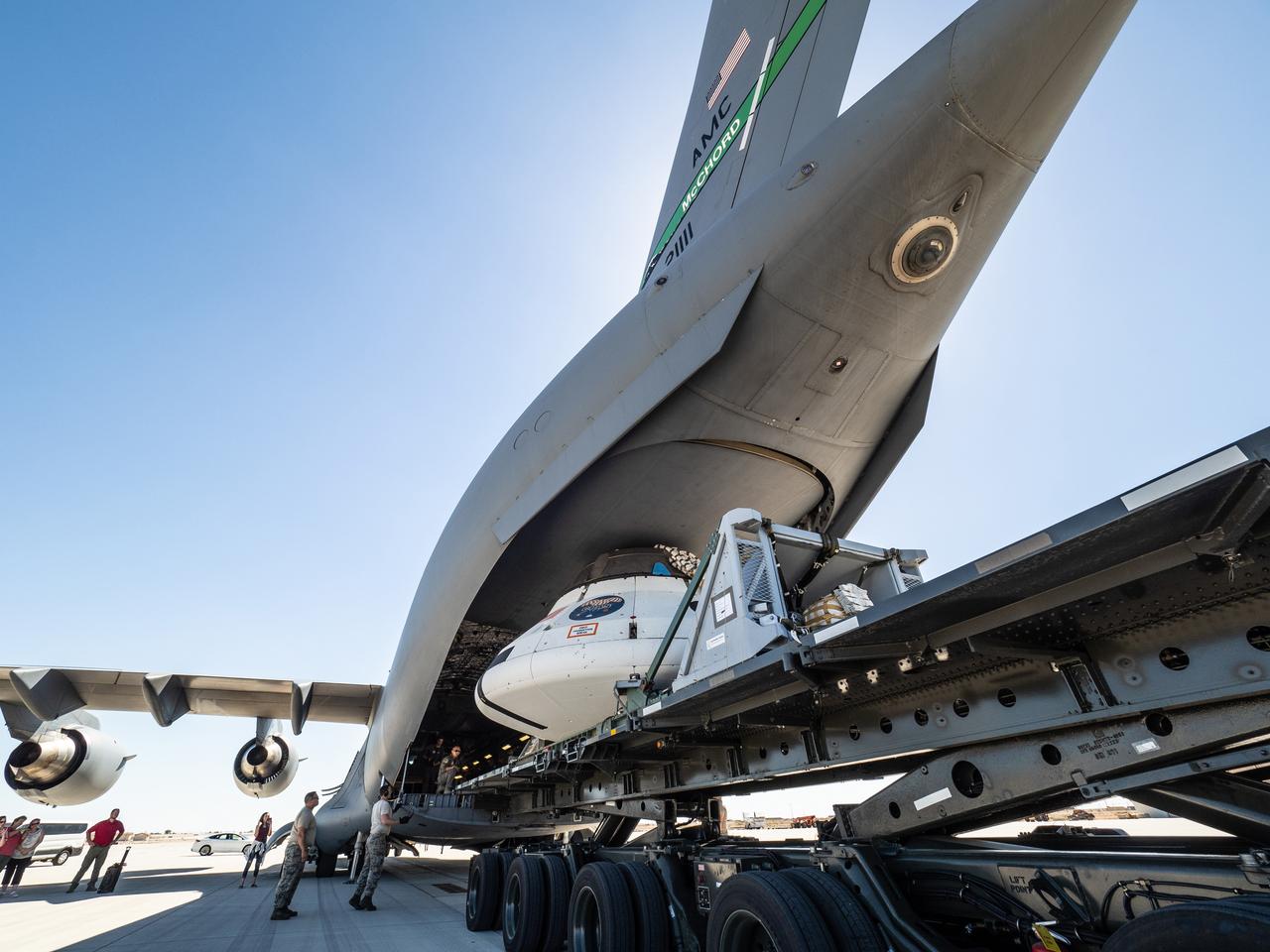 The Orion team prepares the parachute test vehicle for the final drop test which will qualify Orion's parachutes for human flight on Sept. 10, 2018...On September 12, 2018 an Orion test capsule will be dropped from a C-17 aircraft at an altitude of more than six miles to verify the spacecraft’s complex system of 11 parachutes, cannon-like mortars, and pyrotechnic devices work in sequence to slow the capsule’s descent for a safe landing on Earth.