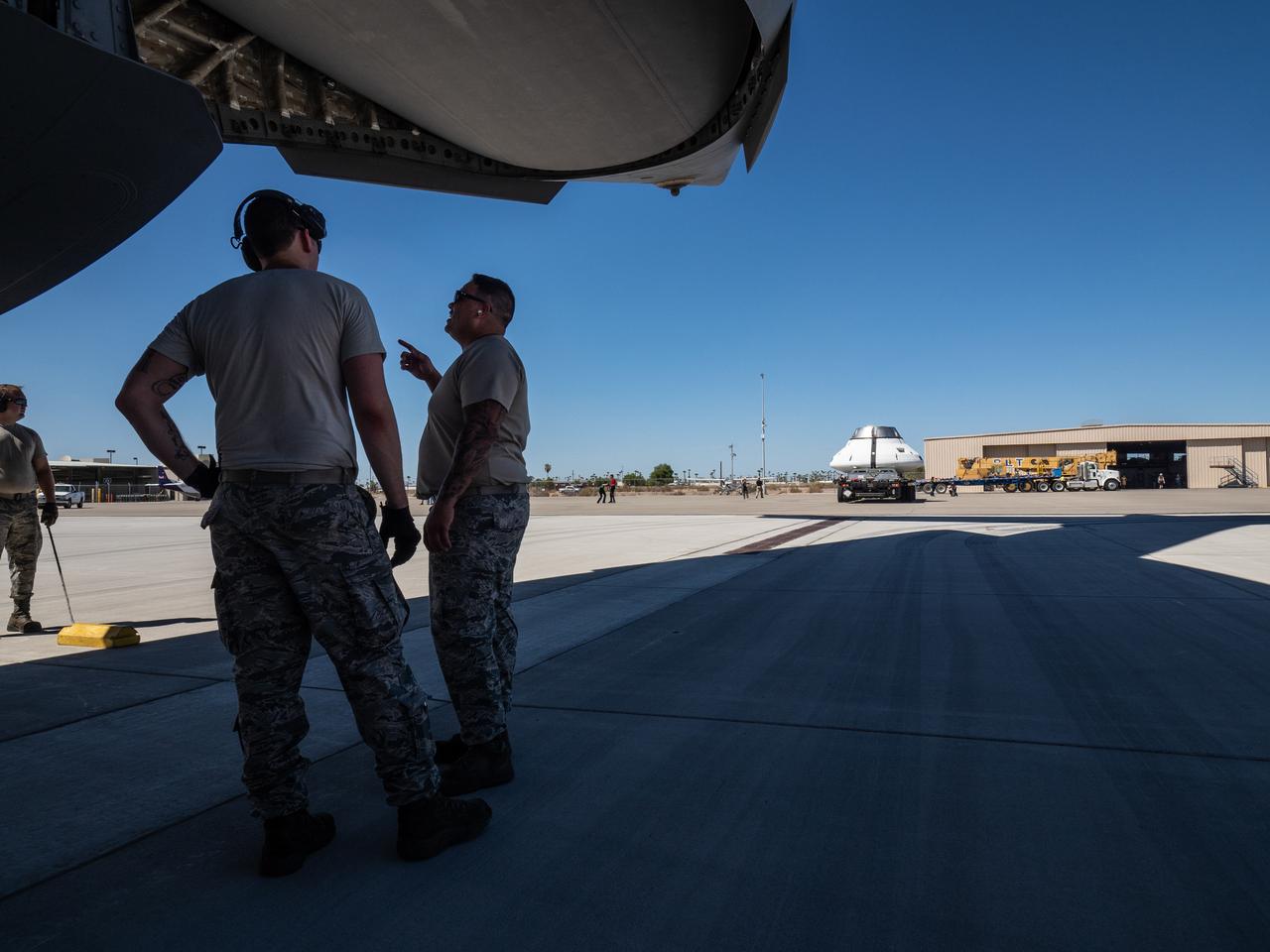 The Orion team prepares the parachute test vehicle for the final drop test which will qualify Orion's parachutes for human flight on Sept. 10, 2018...On September 12, 2018 an Orion test capsule will be dropped from a C-17 aircraft at an altitude of more than six miles to verify the spacecraft’s complex system of 11 parachutes, cannon-like mortars, and pyrotechnic devices work in sequence to slow the capsule’s descent for a safe landing on Earth.