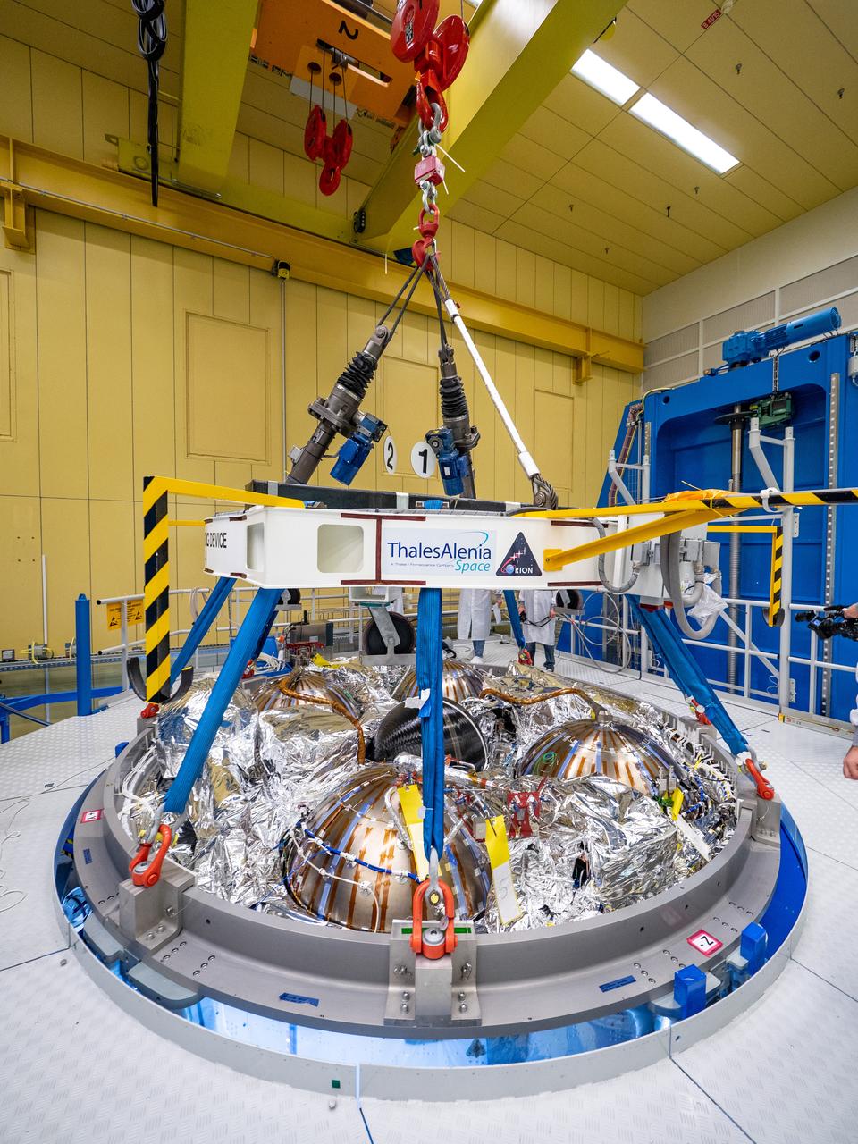 Technicians at the Airbus facility in Bremen, Germany weigh the European Service Module on Oct. 31, 2018 ahead of shipment to Kennedy Space Center. The service module will depart Germany on November 5th, 2018 and will arrive in the U.S. on November 6...For the first time, NASA will use a European-built system as a critical element to power an American spacecraft, extending the international cooperation of the International Space Station into deep space. The European Service Module is a unique collaboration across space agencies and industry including ESA’s prime contractor, Airbus, and 10 European countries. The completion of service module work in Europe and shipment to Kennedy signifies a major milestone toward NASA’s human deep space exploration missions to the Moon and beyond.