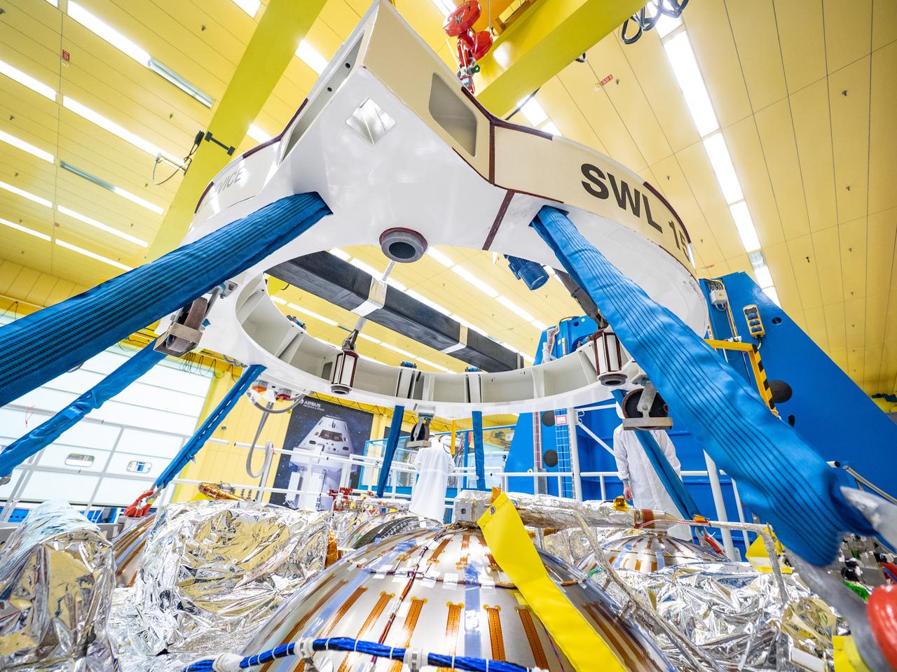 Technicians at the Airbus facility in Bremen, Germany weigh the European Service Module on Oct. 31, 2018 ahead of shipment to Kennedy Space Center. The service module will depart Germany on November 5th, 2018 and will arrive in the U.S. on November 6...For the first time, NASA will use a European-built system as a critical element to power an American spacecraft, extending the international cooperation of the International Space Station into deep space. The European Service Module is a unique collaboration across space agencies and industry including ESA’s prime contractor, Airbus, and 10 European countries. The completion of service module work in Europe and shipment to Kennedy signifies a major milestone toward NASA’s human deep space exploration missions to the Moon and beyond.