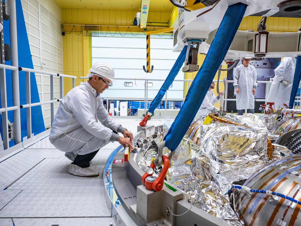 Technicians at the Airbus facility in Bremen, Germany weigh the European Service Module on Oct. 31, 2018 ahead of shipment to Kennedy Space Center. The service module will depart Germany on November 5th, 2018 and will arrive in the U.S. on November 6...For the first time, NASA will use a European-built system as a critical element to power an American spacecraft, extending the international cooperation of the International Space Station into deep space. The European Service Module is a unique collaboration across space agencies and industry including ESA’s prime contractor, Airbus, and 10 European countries. The completion of service module work in Europe and shipment to Kennedy signifies a major milestone toward NASA’s human deep space exploration missions to the Moon and beyond.