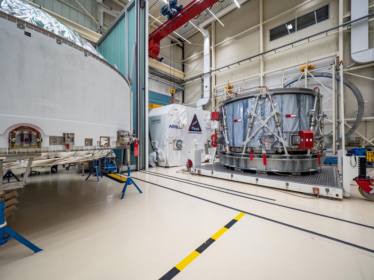 Technicians at the Airbus facility in Bremen, Germany prepare the European Service Module for shipment to Kennedy Space Center on Nov. 1, 2018. The service module will depart Germany on November 5, 2018 and will arrive in the U.S. on November 6...For the first time, NASA will use a European-built system as a critical element to power an American spacecraft, extending the international cooperation of the International Space Station into deep space. The European Service Module is a unique collaboration across space agencies and industry including ESA’s prime contractor, Airbus, and 10 European countries. The completion of service module work in Europe and shipment to Kennedy signifies a major milestone toward NASA’s human deep space exploration missions to the Moon and beyond.