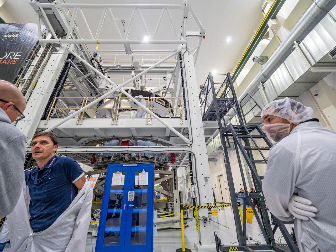 At the Operations and Checkout Building at Kennedy Space Center, Lockheed Martin technicians work to mate Orion's crew module adapter to the European Service Module on Nov. 13, 2018...For the first time, NASA will use a European-built system as a critical element to power an American spacecraft, extending the international cooperation of the International Space Station into deep space. The European Service Module is a unique collaboration across space agencies and industry including ESA’s prime contractor, Airbus, and 10 European countries. The completion of service module work in Europe and shipment to Kennedy signifies a major milestone toward NASA’s human deep space exploration missions to the Moon and beyond.