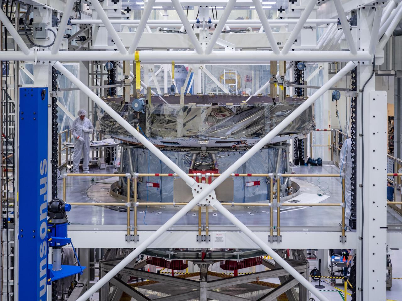 At the Operations and Checkout Building at Kennedy Space Center, Lockheed Martin technicians work to mate Orion's crew module adapter to the European Service Module on Nov. 14, 2018...For the first time, NASA will use a European-built system as a critical element to power an American spacecraft, extending the international cooperation of the International Space Station into deep space. The European Service Module is a unique collaboration across space agencies and industry including ESA’s prime contractor, Airbus, and 10 European countries. The completion of service module work in Europe and shipment to Kennedy signifies a major milestone toward NASA’s human deep space exploration missions to the Moon and beyond.