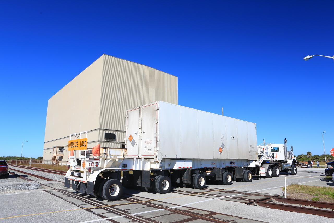 The Northrup Grumman SR118 for Ascent Abort-2 (AA-2) which is loaded with propellants moves from the Launch Abort System Facility (LASF) to the Rotation Protection and Surge Facility at Kennedy Space Center for continued flight processing on Jan. 29, 2019.