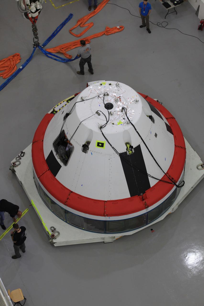 The Launch Abort System for the Ascent Abort-2 (AA-2) Flight Test is vertical and integrated with the crew module test article at the Launch Abort System Facility (LASF) at Kennedy Space Center on March 13, 2019.