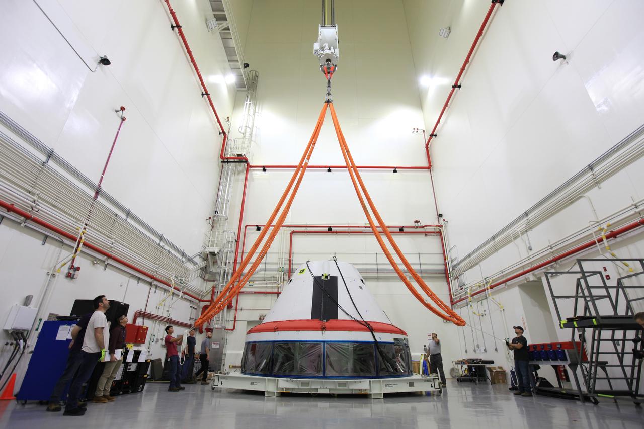 The Launch Abort System for the Ascent Abort-2 (AA-2) Flight Test is vertical and integrated with the crew module test article at the Launch Abort System Facility (LASF) at Kennedy Space Center on March 13, 2019.