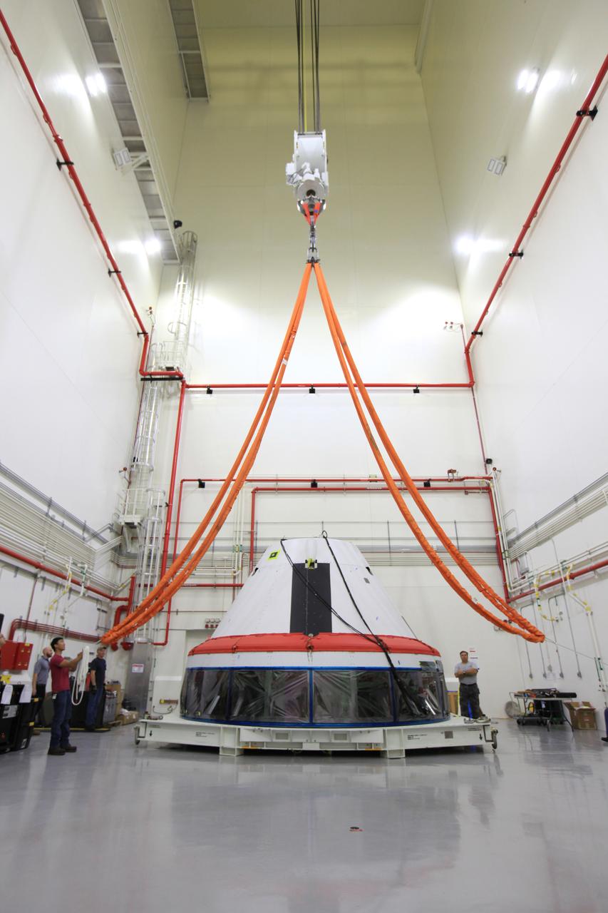 The Launch Abort System for the Ascent Abort-2 (AA-2) Flight Test is vertical and integrated with the crew module test article at the Launch Abort System Facility (LASF) at Kennedy Space Center on March 13, 2019.