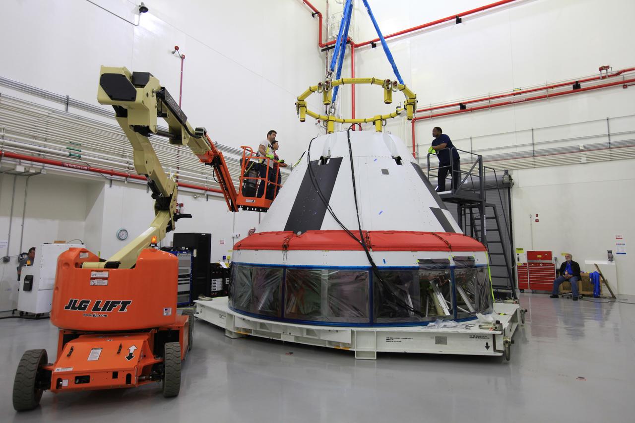 The Launch Abort System for the Ascent Abort-2 (AA-2) Flight Test is vertical and integrated with the crew module test article at the Launch Abort System Facility (LASF) at Kennedy Space Center on March 13, 2019.