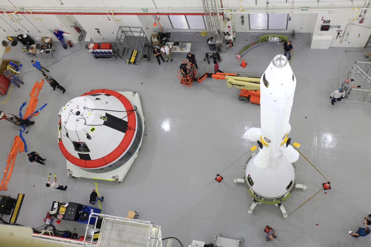 The Launch Abort System for the Ascent Abort-2 (AA-2) Flight Test is vertical and integrated with the crew module test article at the Launch Abort System Facility (LASF) at Kennedy Space Center on March 13, 2019.