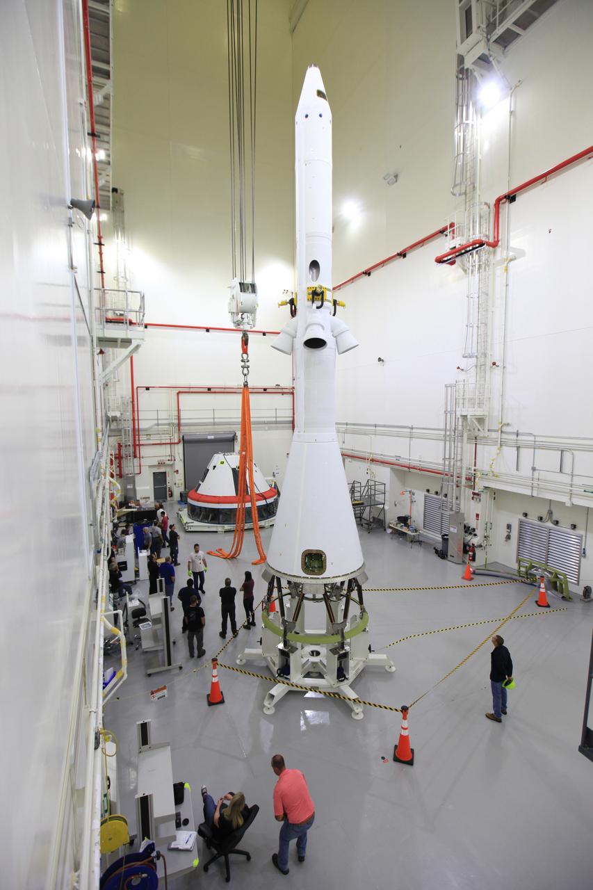 The Launch Abort System for the Ascent Abort-2 (AA-2) Flight Test is vertical and integrated with the crew module test article at the Launch Abort System Facility (LASF) at Kennedy Space Center on March 13, 2019.