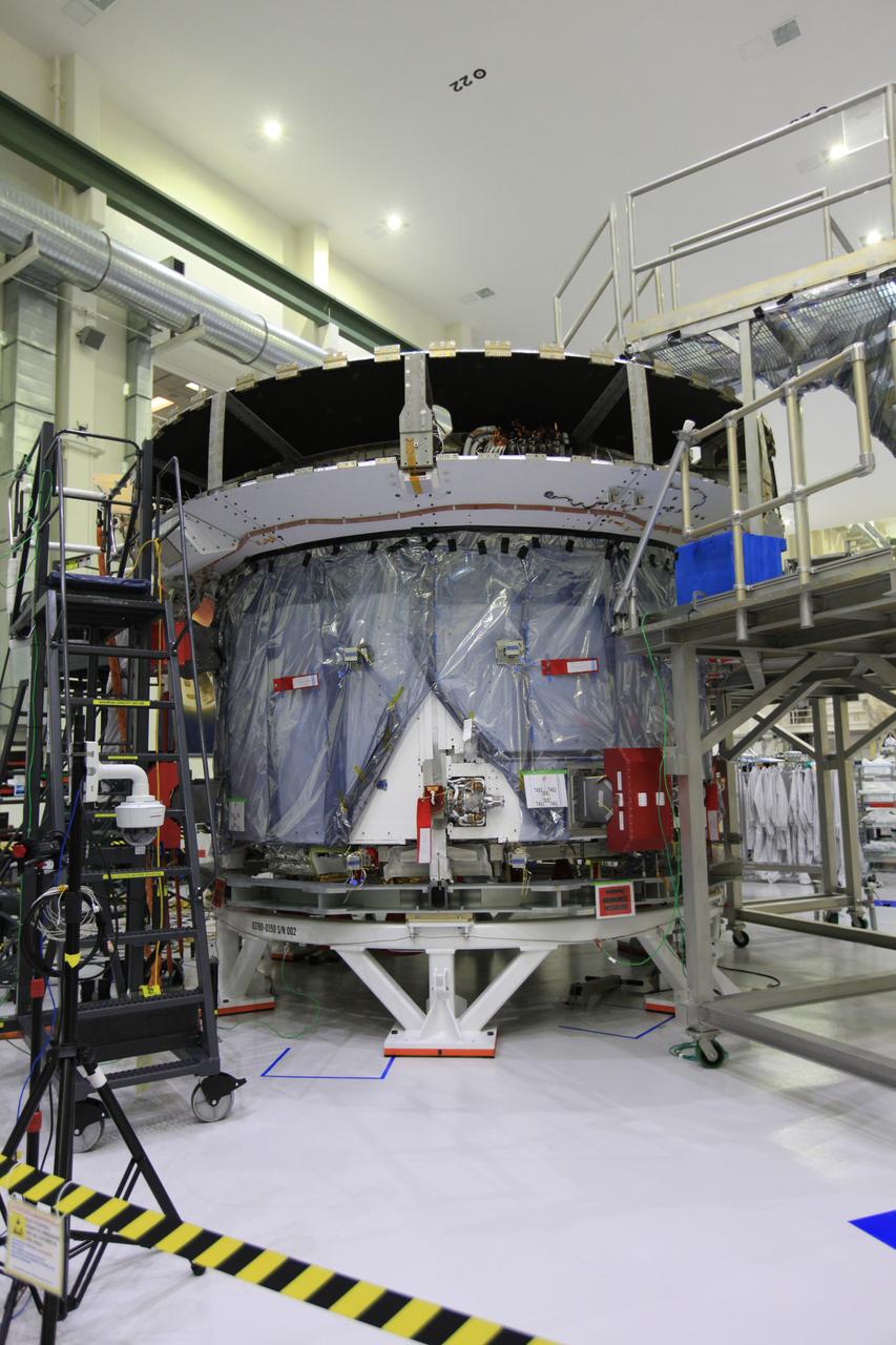The crew and service module for Artemis I continue preparations for mating inside the Operations and Checkout (O&C) Building High Bay at Kennedy Space Center on March 21, 2019. Alongside, the pressure vessel for Artemis II is undergoing install of its secondary structure.