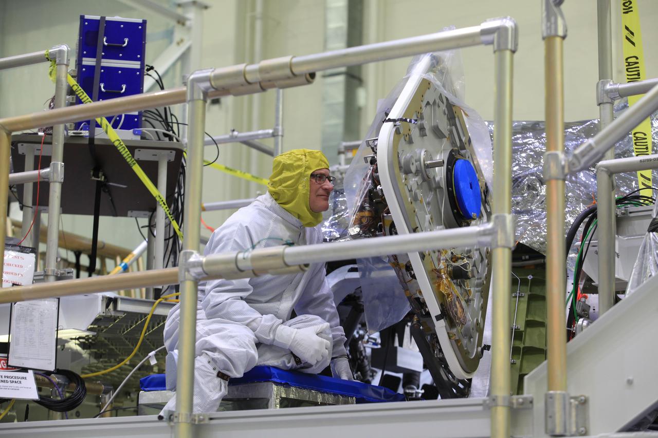 The crew and service module for Artemis I continue preparations for mating inside the Operations and Checkout (O&C) Building High Bay at Kennedy Space Center on March 21, 2019. Alongside, the pressure vessel for Artemis II is undergoing install of its secondary structure.