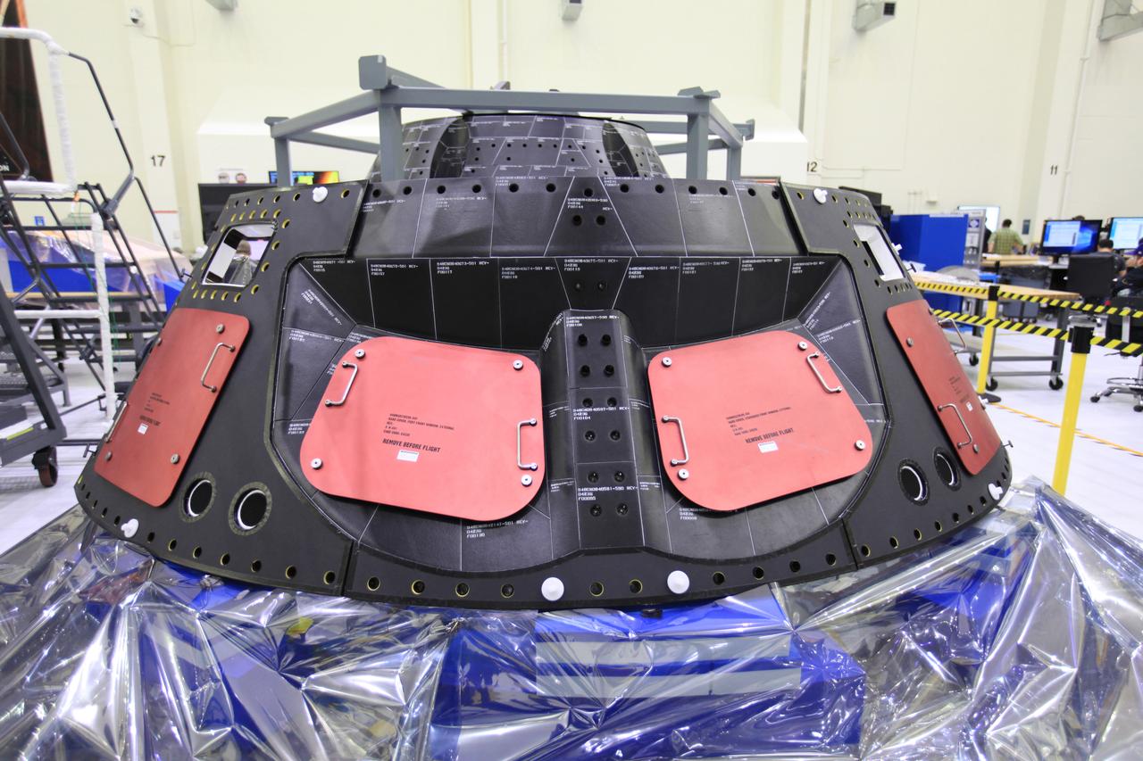 The crew and service module for Artemis I continue preparations for mating inside the Operations and Checkout (O&C) Building High Bay at Kennedy Space Center on March 21, 2019. Alongside, the pressure vessel for Artemis II is undergoing install of its secondary structure.