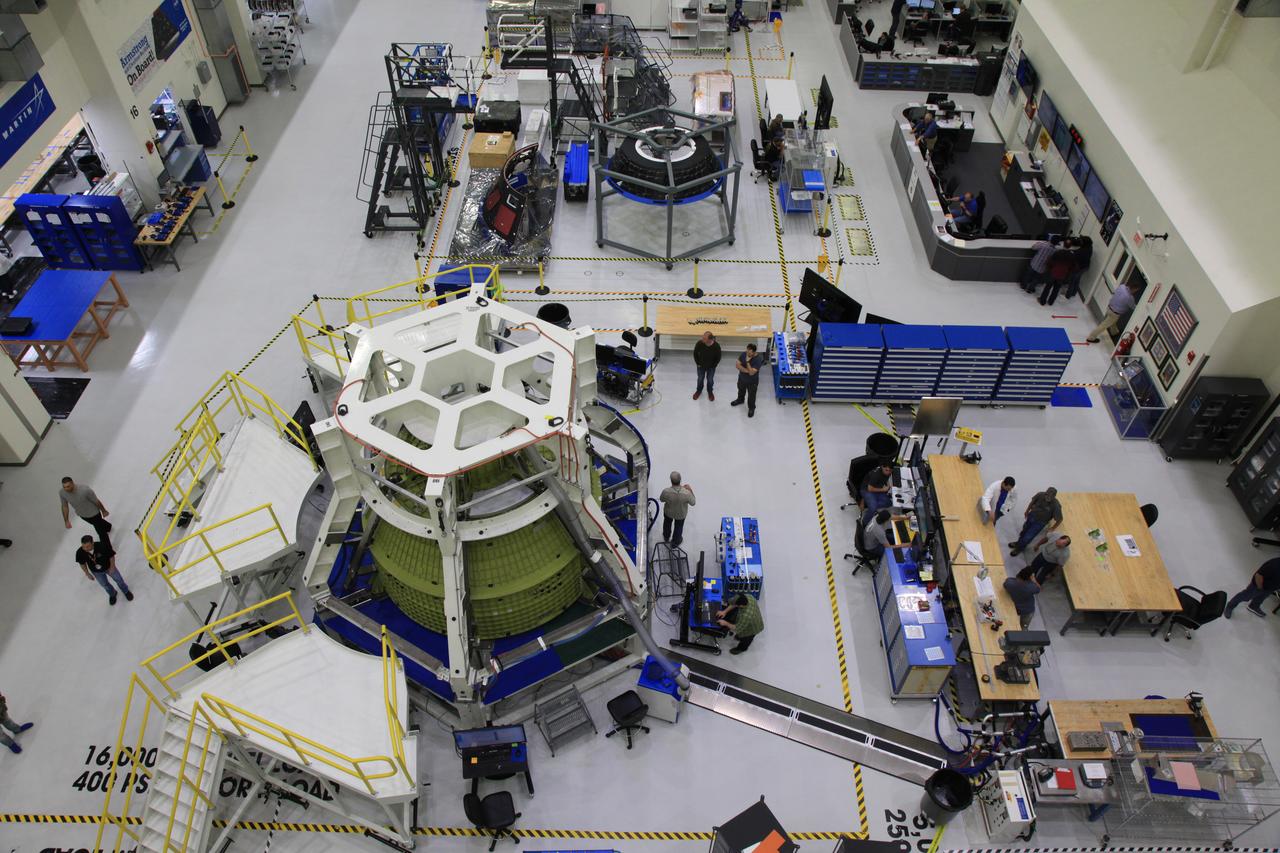 The crew and service module for Artemis I continue preparations for mating inside the Operations and Checkout (O&amp;C) Building High Bay at Kennedy Space Center on March 21, 2019. Alongside, the pressure vessel for Artemis II is undergoing install of its secondary structure.