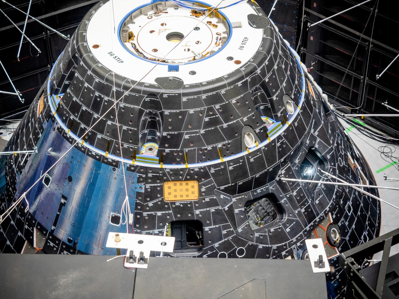 The Orion crew module for Artemis I, shown here on May 2, 2019, recently underwent Direct Field Acoustics Test (DFAT) where it was exposed to maximum acoustics levels that the vehicle will experience in space. Spacecraft response and sound pressure data were collected with microphones, strain gauges and accelerometers. The max decibel level was -12dB.