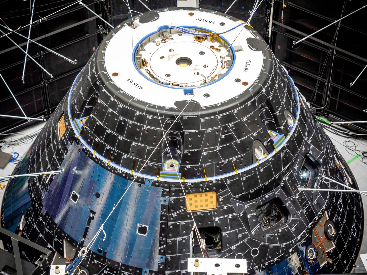 The Orion crew module for Artemis I, shown here on May 2, 2019, recently underwent Direct Field Acoustics Test (DFAT) where it was exposed to maximum acoustics levels that the vehicle will experience in space. Spacecraft response and sound pressure data were collected with microphones, strain gauges and accelerometers. The max decibel level was -12dB.