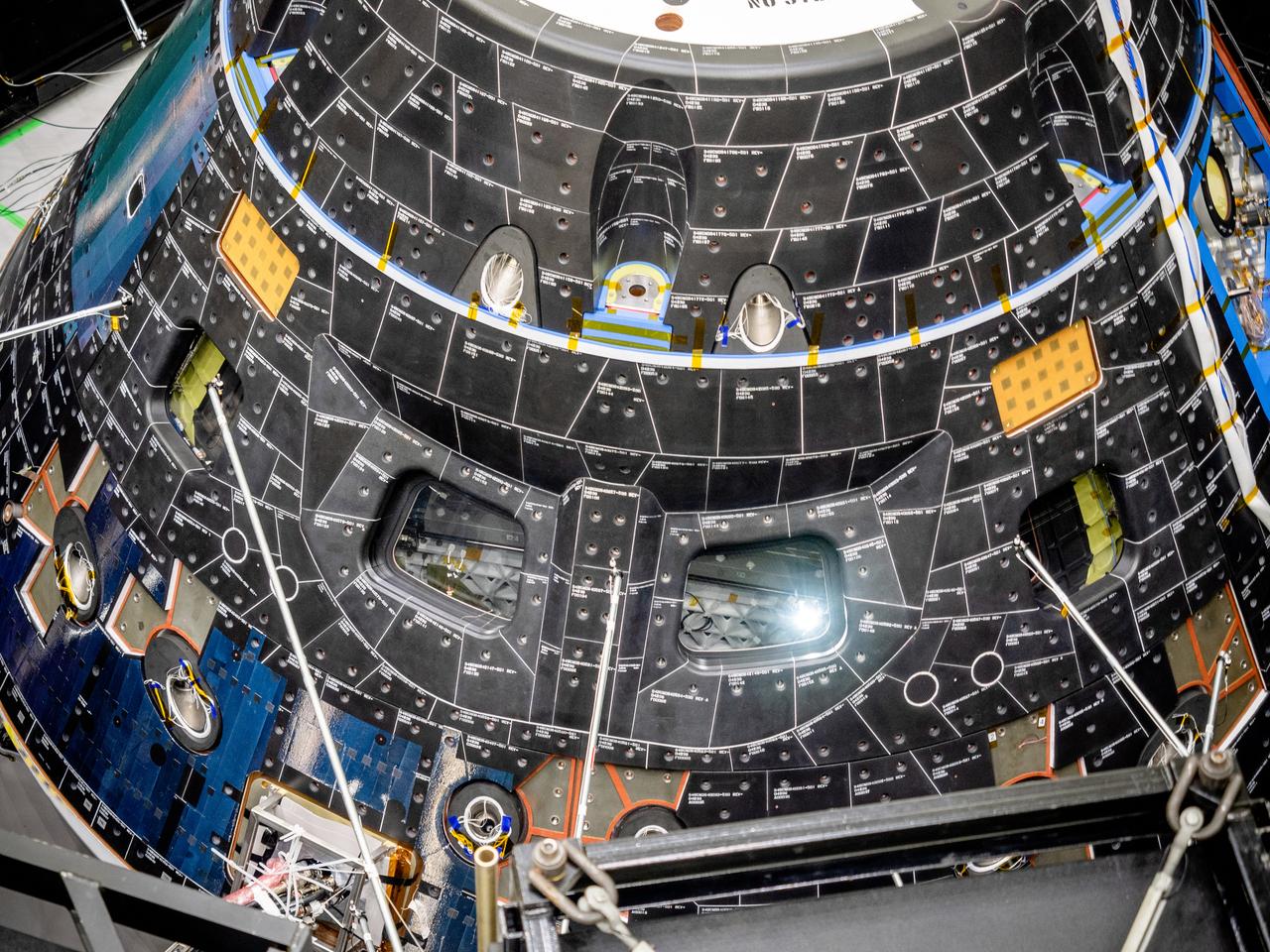 The Orion crew module for Artemis I, shown here on May 2, 2019, recently underwent Direct Field Acoustics Test (DFAT) where it was exposed to maximum acoustics levels that the vehicle will experience in space. Spacecraft response and sound pressure data were collected with microphones, strain gauges and accelerometers. The max decibel level was -12dB.