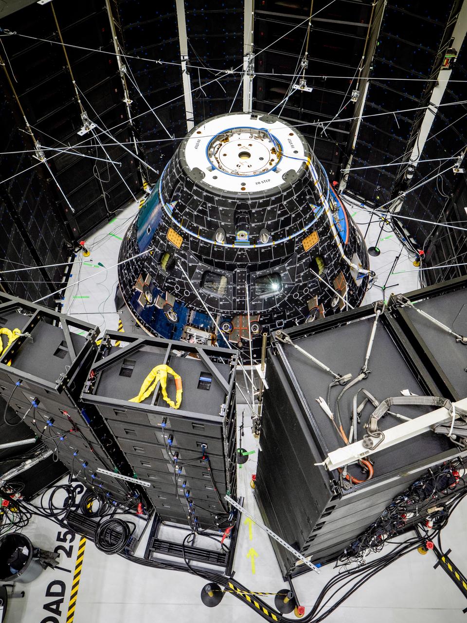 The Orion crew module for Artemis I, shown here on May 2, 2019, recently underwent Direct Field Acoustics Test (DFAT) where it was exposed to maximum acoustics levels that the vehicle will experience in space. Spacecraft response and sound pressure data were collected with microphones, strain gauges and accelerometers. The max decibel level was -12dB.
