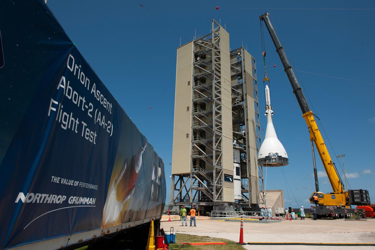 The Orion Ascent Abort-2 (AA-2) vehicle arrives at the launch pad for stacking with the abort test booster on May 23, 2019.