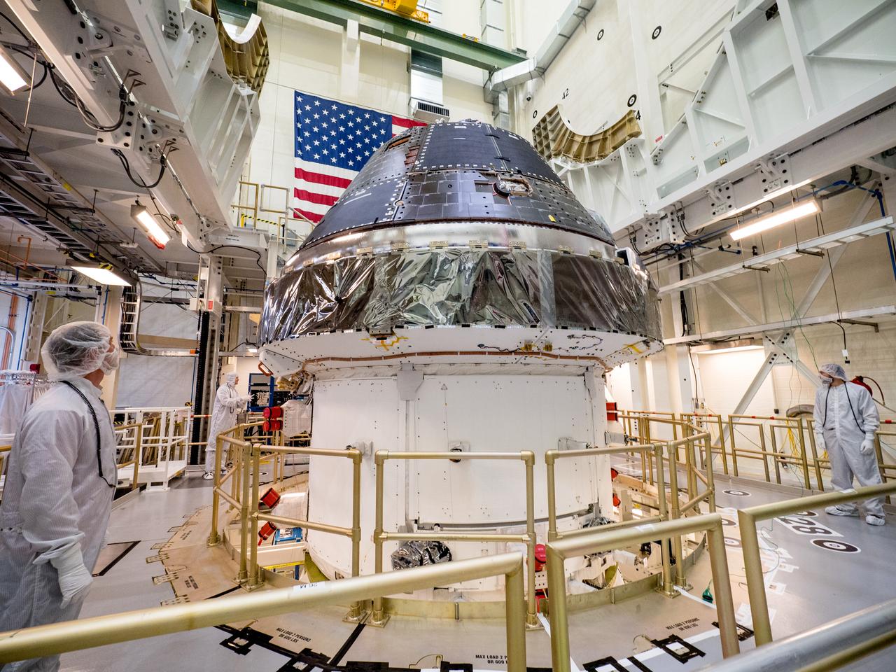 Vice President Mike Pence visited and gave remarks in the Neil Armstrong Operations and Checkout Building at NASA’s Kennedy Space Center in Florida on July 20, 2019 to commemorate the 50th anniversary of the agency’s Apollo 11 Moon landing and announce to America the completion of NASA’s Orion crew capsule, shown here on July 19, 2019, for the first Artemis lunar mission.