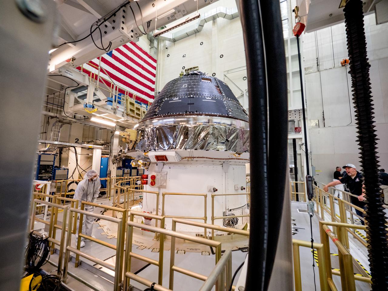Vice President Mike Pence visited and gave remarks in the Neil Armstrong Operations and Checkout Building at NASA’s Kennedy Space Center in Florida on July 20, 2019 to commemorate the 50th anniversary of the agency’s Apollo 11 Moon landing and announce to America the completion of NASA’s Orion crew capsule, shown here on July 19, 2019, for the first Artemis lunar mission.