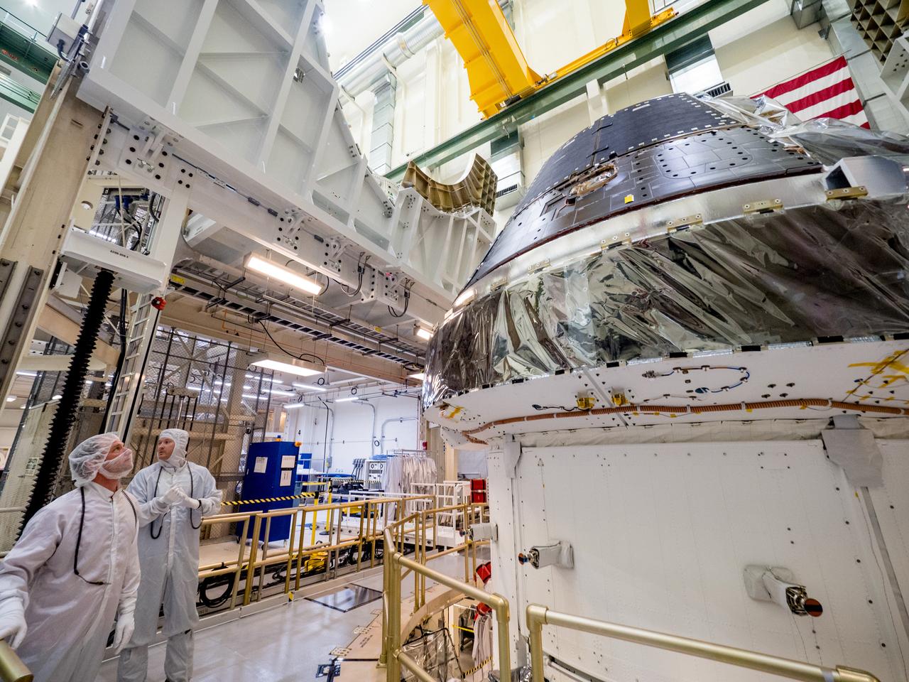 Vice President Mike Pence visited and gave remarks in the Neil Armstrong Operations and Checkout Building at NASA’s Kennedy Space Center in Florida on July 20, 2019 to commemorate the 50th anniversary of the agency’s Apollo 11 Moon landing and announce to America the completion of NASA’s Orion crew capsule, shown here on July 19, 2019, for the first Artemis lunar mission.