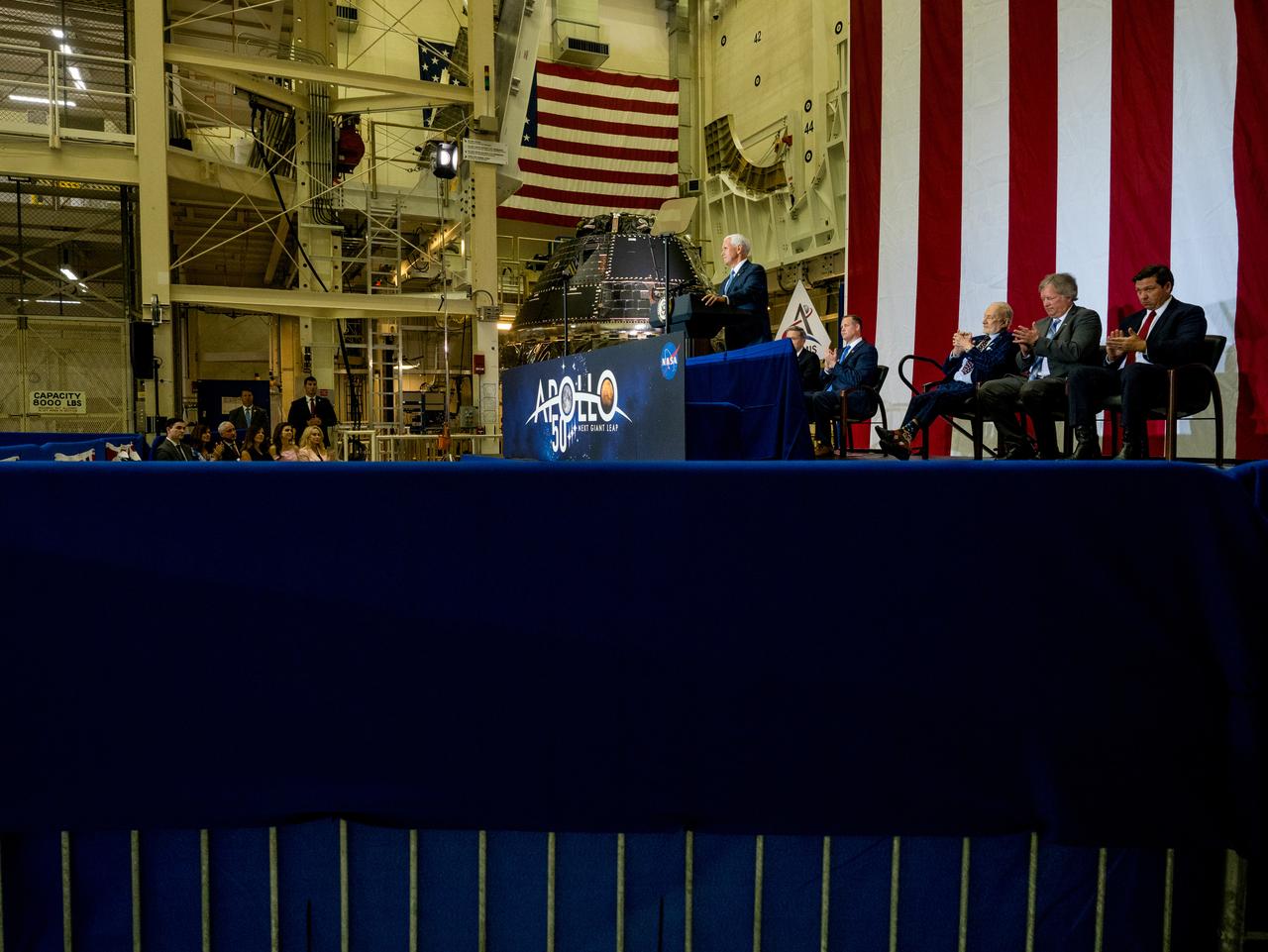 Vice President Mike Pence visited and gave remarks in the Neil Armstrong Operations and Checkout Building at NASA’s Kennedy Space Center in Florida on July 20, 2019 to commemorate the 50th anniversary of the agency’s Apollo 11 Moon landing and announce to America the completion of NASA’s Orion crew capsule, shown here on July 19, 2019, for the first Artemis lunar mission.