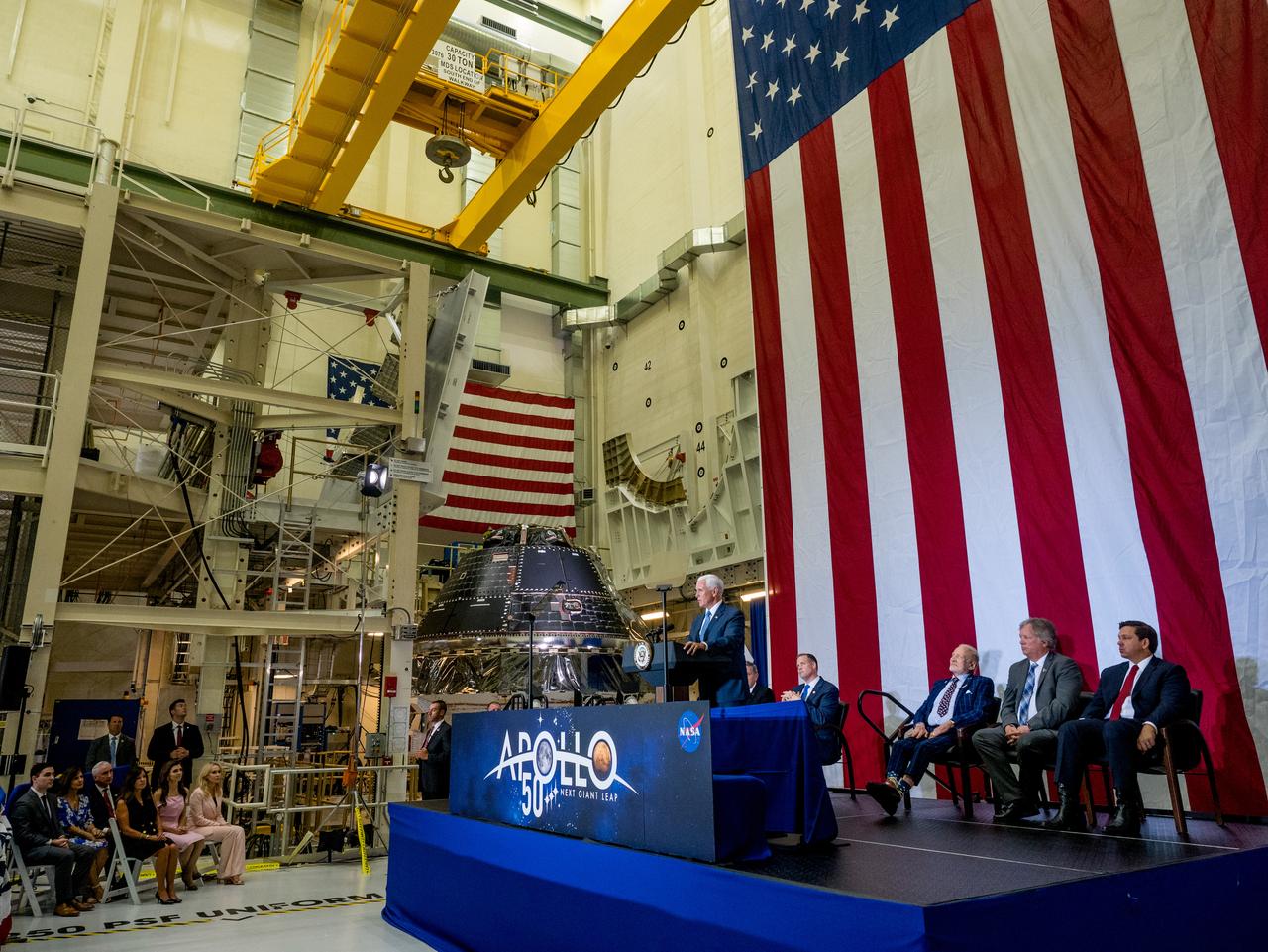 Vice President Mike Pence visited and gave remarks in the Neil Armstrong Operations and Checkout Building at NASA’s Kennedy Space Center in Florida on July 20, 2019 to commemorate the 50th anniversary of the agency’s Apollo 11 Moon landing and announce to America the completion of NASA’s Orion crew capsule, shown here on July 19, 2019, for the first Artemis lunar mission.