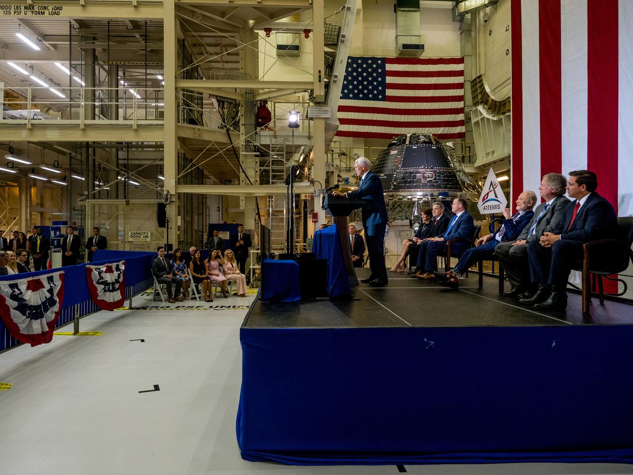 Vice President Mike Pence visited and gave remarks in the Neil Armstrong Operations and Checkout Building at NASA’s Kennedy Space Center in Florida on July 20, 2019 to commemorate the 50th anniversary of the agency’s Apollo 11 Moon landing and announce to America the completion of NASA’s Orion crew capsule, shown here on July 19, 2019, for the first Artemis lunar mission.