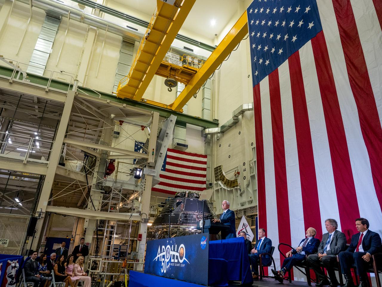 Vice President Mike Pence visited and gave remarks in the Neil Armstrong Operations and Checkout Building at NASA’s Kennedy Space Center in Florida on July 20, 2019 to commemorate the 50th anniversary of the agency’s Apollo 11 Moon landing and announce to America the completion of NASA’s Orion crew capsule, shown here on July 19, 2019, for the first Artemis lunar mission.