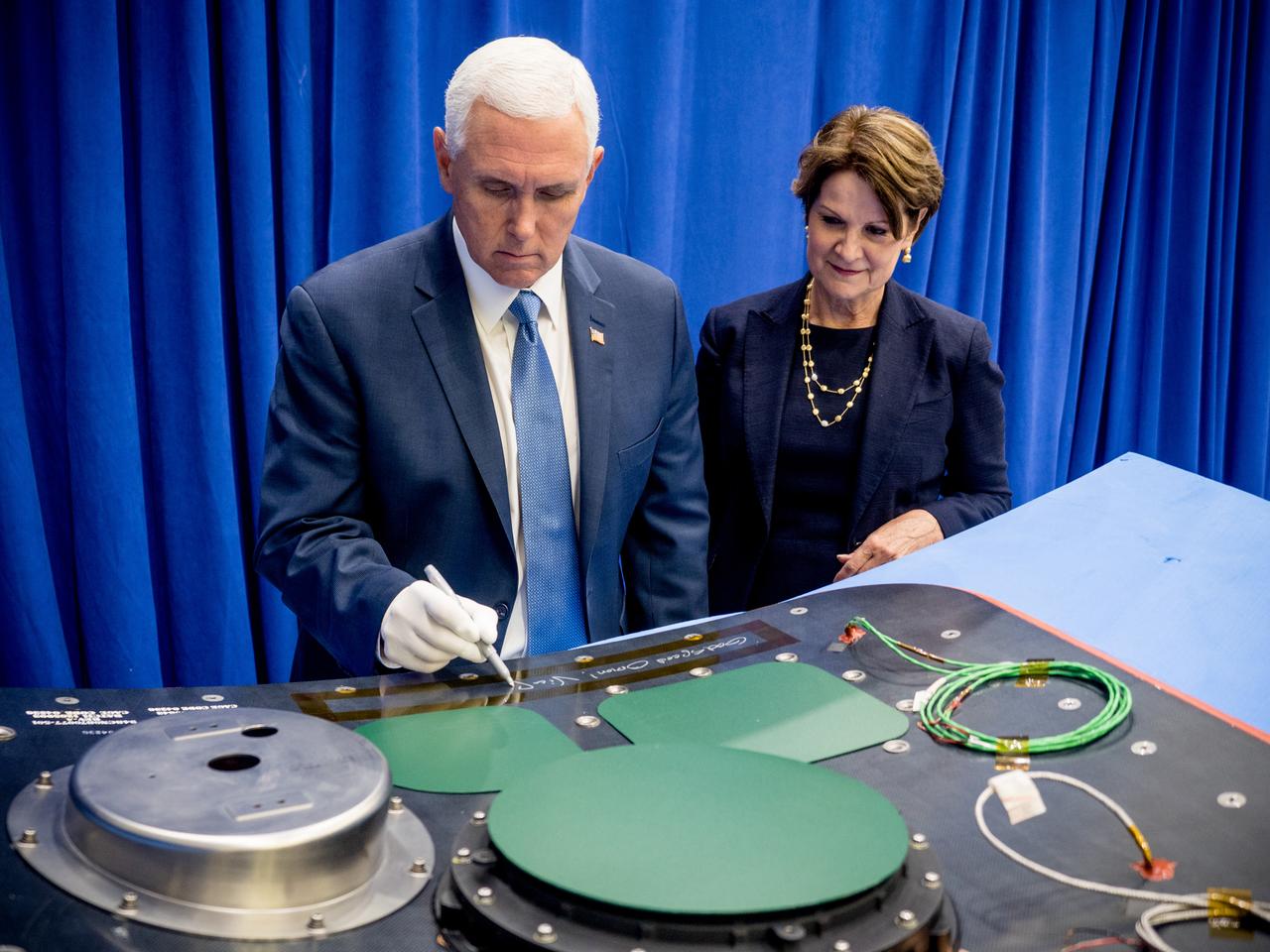 Vice President Mike Pence visited and gave remarks in the Neil Armstrong Operations and Checkout Building at NASA’s Kennedy Space Center in Florida on July 20, 2019 to commemorate the 50th anniversary of the agency’s Apollo 11 Moon landing and announce to America the completion of NASA’s Orion crew capsule, shown here on July 19, 2019, for the first Artemis lunar mission.