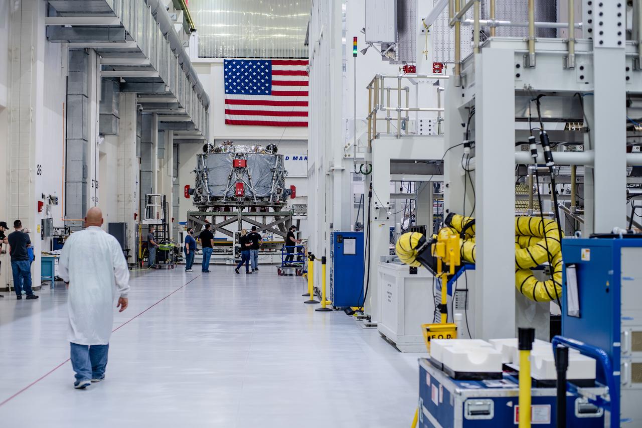 The crew module adapter, which connects Orion's crew module with the European Service Module, is lifted in preparation for mating with the Artemis II service module at Kennedy Space Center on Feb. 11, 2020.