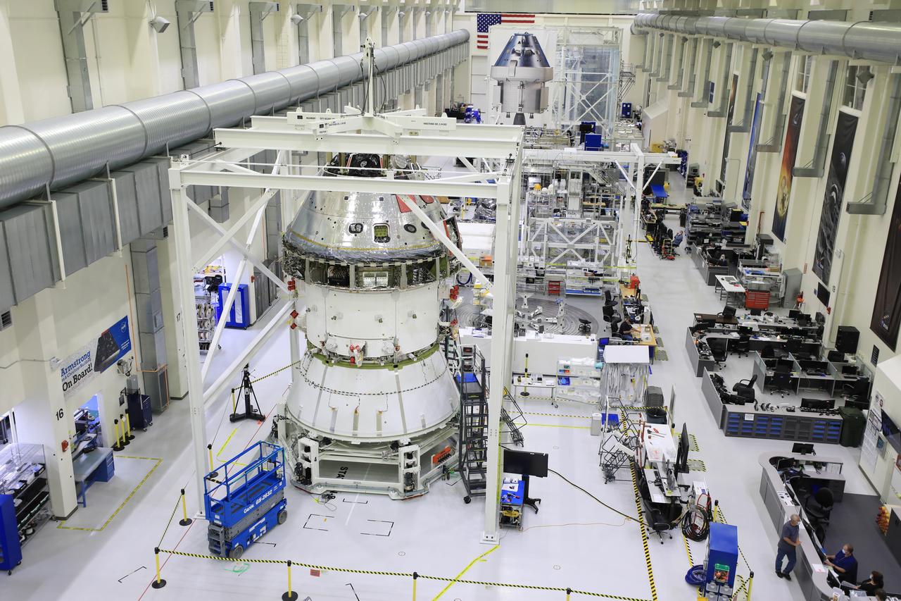 Installation of the spacecraft adapter (SA) cone to the Artemis I Orion spacecraft shown in progress inside the Neil Armstrong Operations and Checkout Building on Aug. 10, 2020. This is one of the final major hardware operations the spacecraft will undergo during closeout processing prior to being integrated with the Space Launch System (SLS) rocket in preparation for the first Artemis mission. The spacecraft adapter cone connects the bottom portion of Orion’s service module to the top part of the rocket known as the interim cryogenic propulsion stage (ICPS). Orion will fly on the agency’s Artemis I mission – the first in a series of increasingly complex missions to the Moon that will ultimately lead to the exploration of Mars.