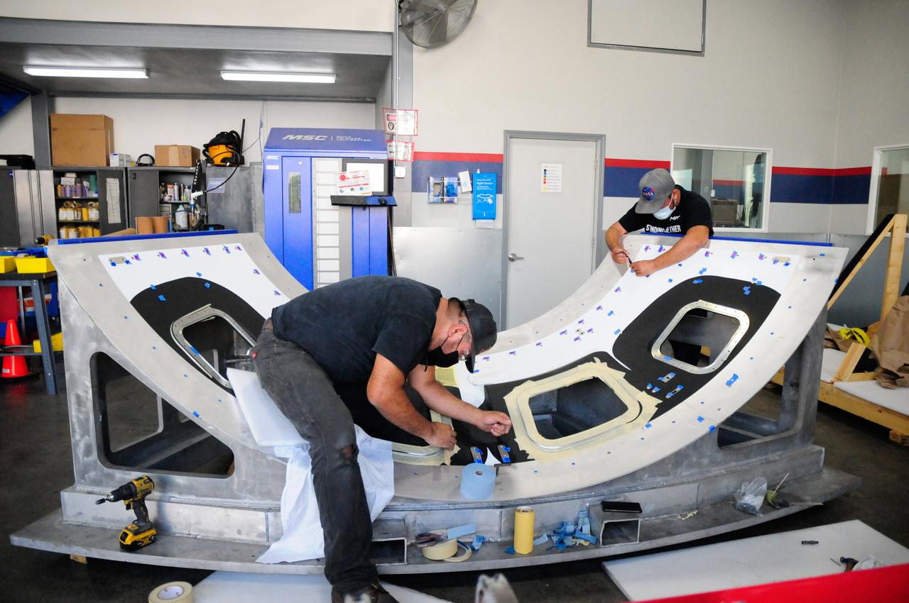 The first element machined for the Artemis III Orion crew module – a cone panel with openings for windows, designed by Orion’s lead contractor, Lockheed Martin, and manufactured by AMRO Fabricating Corp., of South El Monte, California, is shown here on Aug. 14, 2020. The completed panel is on its way to NASA’s Michoud Assembly Facility near New Orleans, Louisiana, where engineers will weld it with other panels as part of Orion’s pressure vessel.