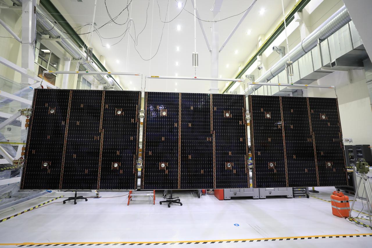 Inside the Neil Armstrong Operations and Checkout Building high bay at NASA’s Kennedy Space Center in Florida, in preparation for installation on the Artemis I spacecraft, technicians have extended one of the Artemis I solar array wings for inspection on Sept. 10, 2020, to confirm that it unfurled properly and all of the mechanisms functioned as expected. The solar array is one of four panels that will generate 11 kilowatts of power and span about 63 feet. The array is a component of Orion’s service module, which is provided by the European Space Agency and built by Airbus Defence and Space to supply Orion’s power, propulsion, air and water. The first in a series of increasingly complex missions, Artemis I will test the Orion spacecraft and Space Launch System as an integrated system ahead of crewed flights to the Moon.