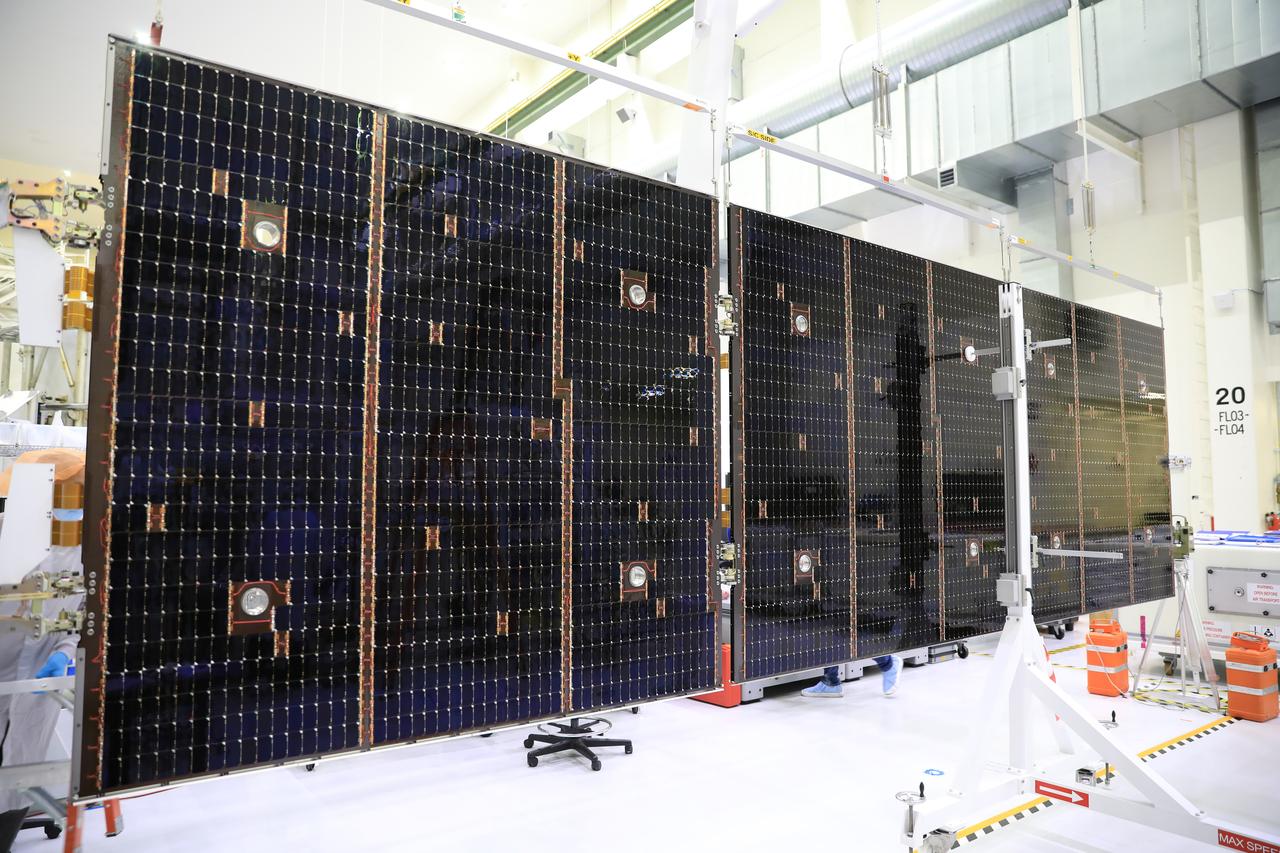 Inside the Neil Armstrong Operations and Checkout Building high bay at NASA’s Kennedy Space Center in Florida, in preparation for installation on the Artemis I spacecraft, technicians have extended one of the Artemis I solar array wings for inspection on Sept. 10, 2020, to confirm that it unfurled properly and all of the mechanisms functioned as expected. The solar array is one of four panels that will generate 11 kilowatts of power and span about 63 feet. The array is a component of Orion’s service module, which is provided by the European Space Agency and built by Airbus Defence and Space to supply Orion’s power, propulsion, air and water. The first in a series of increasingly complex missions, Artemis I will test the Orion spacecraft and Space Launch System as an integrated system ahead of crewed flights to the Moon.