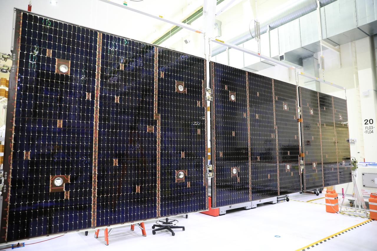 Inside the Neil Armstrong Operations and Checkout Building high bay at NASA’s Kennedy Space Center in Florida, in preparation for installation on the Artemis I spacecraft, technicians have extended one of the Artemis I solar array wings for inspection on Sept. 10, 2020, to confirm that it unfurled properly and all of the mechanisms functioned as expected. The solar array is one of four panels that will generate 11 kilowatts of power and span about 63 feet. The array is a component of Orion’s service module, which is provided by the European Space Agency and built by Airbus Defence and Space to supply Orion’s power, propulsion, air and water. The first in a series of increasingly complex missions, Artemis I will test the Orion spacecraft and Space Launch System as an integrated system ahead of crewed flights to the Moon.