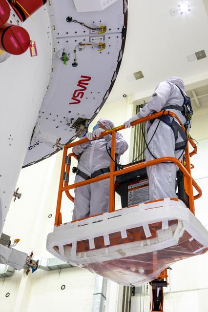 NASA image: NASA and ESA logo installation on Artemis I spacecraft