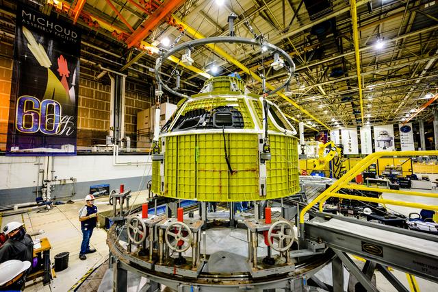 NASA image: Orion crew module pressure vessel lifted from welding tool