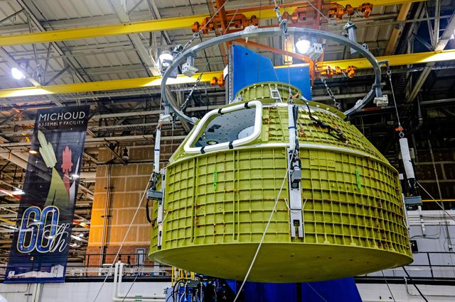 NASA image: Orion crew module pressure vessel lifted from welding tool