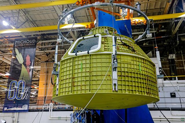 NASA image: Orion crew module pressure vessel lifted from welding tool