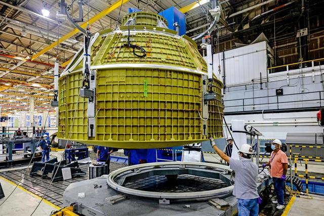 NASA image: Orion crew module pressure vessel lifted from welding tool